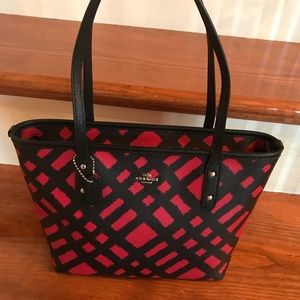 Red and black coach bag with matching wallet